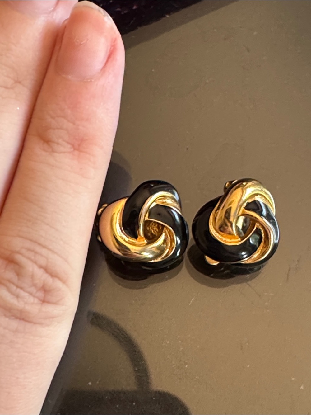 Vintage givenchy black and gold tone knot clip on earrings